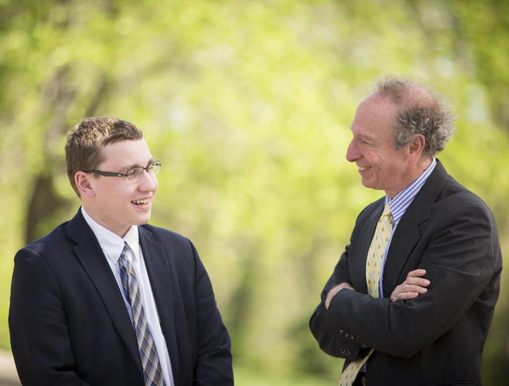 Rick talking with client