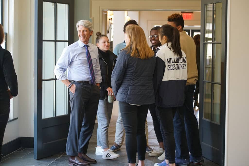 Drew Casertano and others standing around and talking